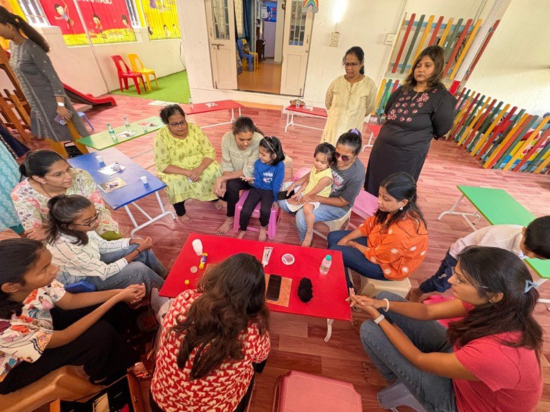 Families painting and creating at a weekend art event in Pune